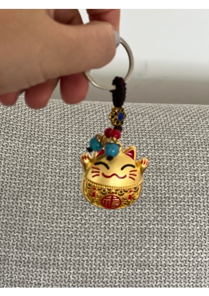Feng Shui Bereket ve Şans Kedisi Anahtarlığı (Maneki Neko Kırmızı Detaylı Gold Anahtarlık) modelleri