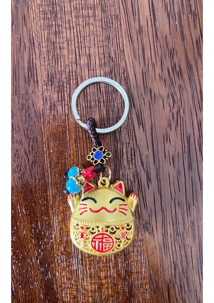 Feng Shui Bereket ve Şans Kedisi Anahtarlığı (Maneki Neko Kırmızı Detaylı Gold Anahtarlık) fırsatları