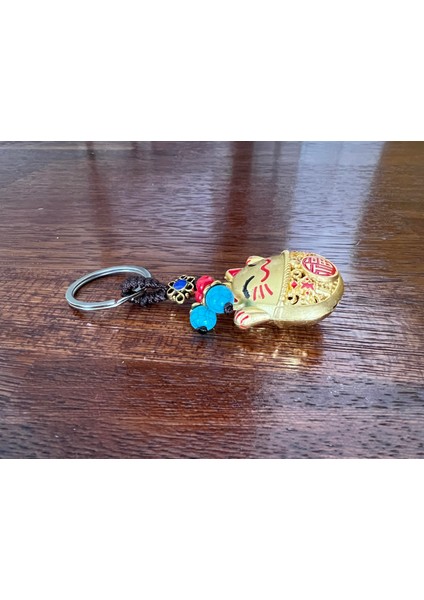 Feng Shui Bereket ve Şans Kedisi Anahtarlığı (Maneki Neko Kırmızı Detaylı Gold Anahtarlık) indirimleri