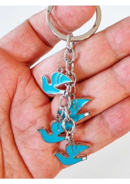 Kanat Çırpan Mavi Güvercilerden Metal Anahtarlık indirimleri