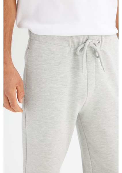 Regular Fit Normal Kesim Ribanalı Paça Gri Melanj Sweatpant Eşofman Altı fırsatları