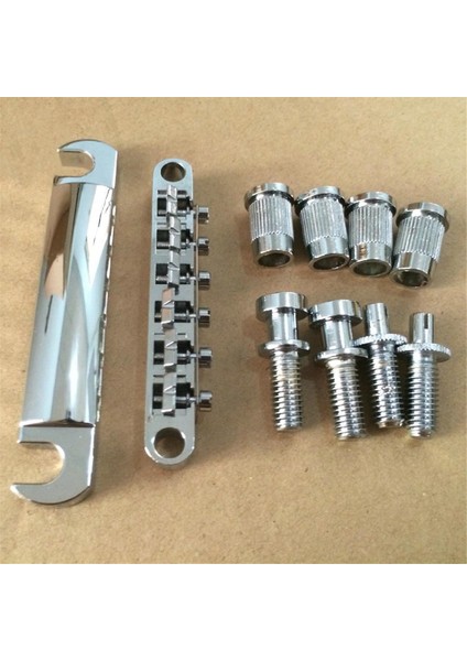 Elektro Gitar Köprüsü, Standart 6 Dize Boyut Lp Gitar Köprüsü Tam Set Köprü Tail Stud Zinc Alaşım Gitar Aksesuarları (Yurt Dışından) fiyatları