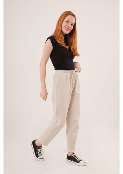 Cepli Belden Bağlamalı Paça Detaylı Krem Pantolon fiyatları