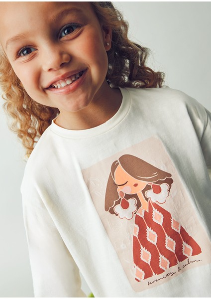 Kız Çocuk 2’li Set (4-10 Yaş) – Krem Renk Baskılı Pamuk Bluz ve Çiçek Desenli Tokalı Set modelleri