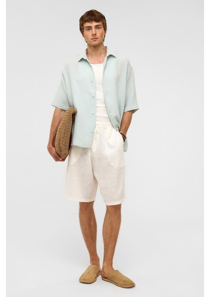 Oversize Kısa Kollu Müslin Kumaş Gömlek Mavi fiyatları