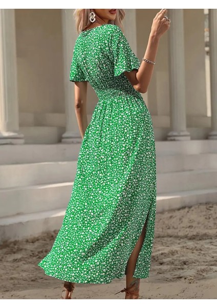 Kadın Kısa Kollu Kruvaze Yaka Beli Lastikli Yanlardan Yırtmaçlı Uzun Çiçekli Elbise modelleri