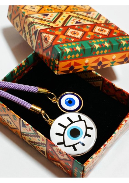 Göz Desenli Beyaz Cam Boncuk ve Küçük Sarı Metal Nazar Boncuklu Anahtarlık