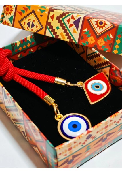 Kırmızı ve Mavi Nazar Boncuklu Sarı Metalli Kırmızı Ipli Anahtarlık indirimleri