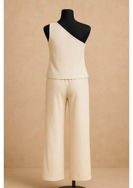 Marsilyan- Kadın Beyaz Tek Omuzlu Şık Bluz & Geniş Paça Pantolon Ikili Takım indirimleri