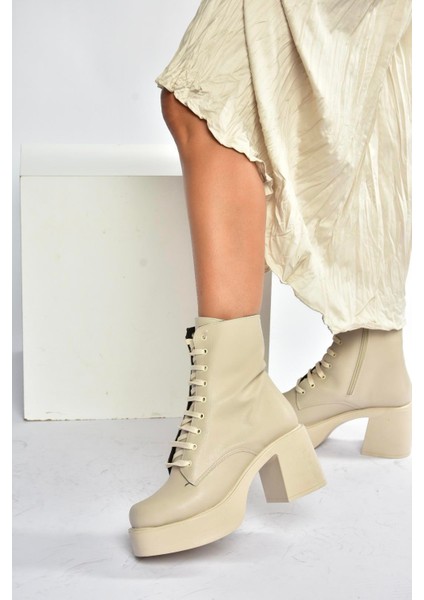 V726681509 Bej Kalın Topuklu Bağcıklı Kadın Bot fırsatları