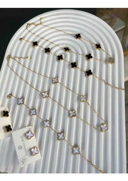 Gold Yonca Model Siyah Beyaz Kolye ve Bileklik Ikili Takım fiyatları