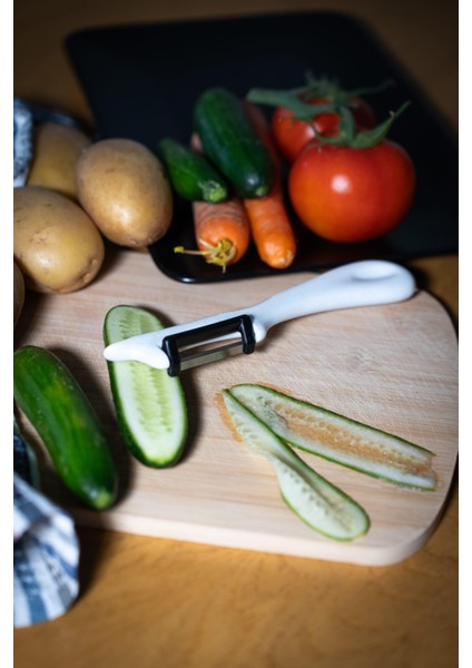 Simli Beyaz Dikey Soyacak – Paslanmaz Alman Çeliği, Ergonomik Sap, Çift Yönlü Kesici Ağız fiyatları