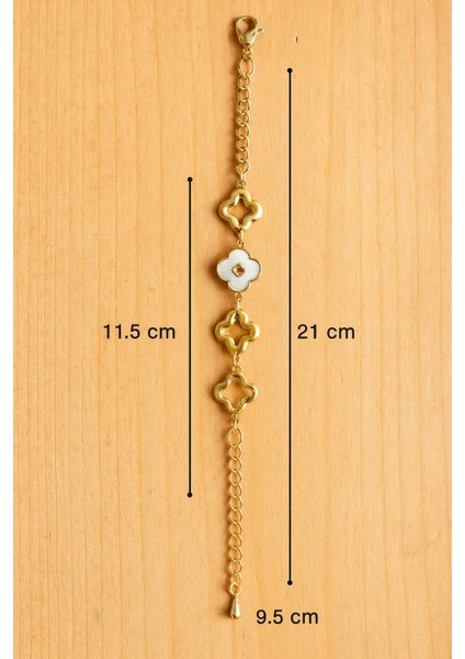 Kadın Beyaz Mineli Yonca Objeli Gold Renkli Çelik Bileklik modelleri