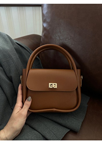 Kadın Gold Kilit Detaylı Ayarlanabilir Askılı Taba El Omuz ve Çapraz Çanta Mona modelleri