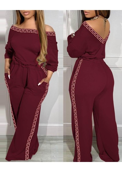 Kadın Uzun Kollu Omuzlardan Açık Beli Lastikli Cepli Şerit Desenli Viskon Iki Iplik Tulum fiyatları