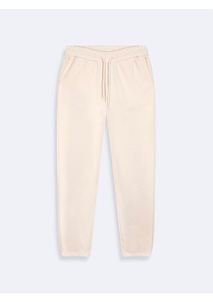 Önü Lastikli Dar Paça Basıc Krem Eşofman