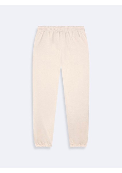 Önü Lastikli Dar Paça Basıc Krem Eşofman fiyatları