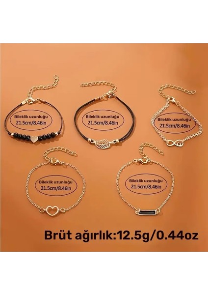 Kadın Kol Saati ve Bileklik Seti - Siyah Rose Gold ST703 indirimleri