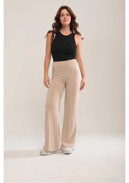 Kadın Bej Modal Bol Paça Çımalı Yüksek Bel Yumuşak Dokulu Beli Lastikli Likralı Pantolon modelleri
