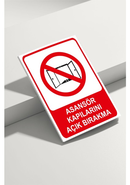 Asansör Kapılarını Açık Bırakma Isg Uyarı Levhası