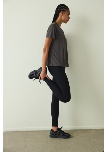 Siyah Yüksek Bel Toparlayıcı Cut Out Detaylı Fitilli Tayt