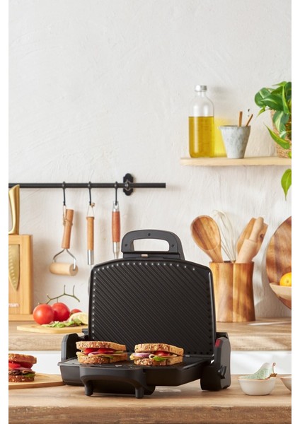 Pratik ve Şık 4 Dilimli Tost Makinesi, Siyah Renkli, Hızlı ve Kullanışlı. fiyatları