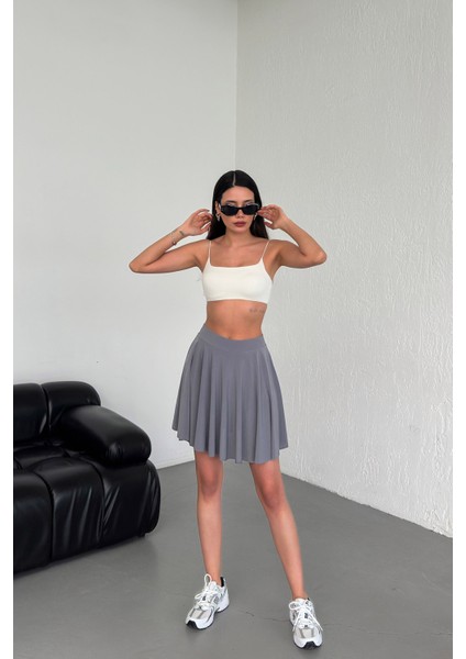 Kadın Kloş Model Volanlı Yumuşak Dokulu Esnek Beli Lastikli Sandy Kumaş Içi Şortlu Etek modelleri