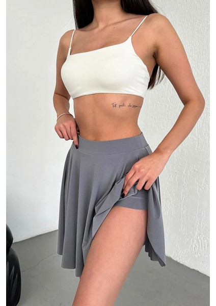 Kadın Kloş Model Volanlı Yumuşak Dokulu Esnek Beli Lastikli Sandy Kumaş Içi Şortlu Etek fırsatları
