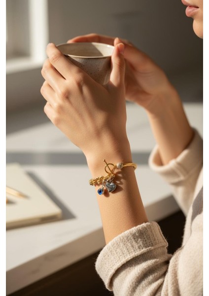 925 Ayar Gümüş Kalp Charm Nazar Boncuklu Burgu Model Bileklik Kadın fiyatları