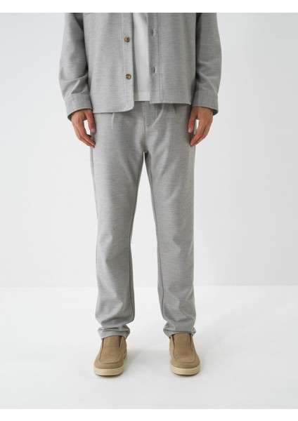 Erkek Bej Esnek Dokulu Regular Fit Jogger Pantolon fiyatları