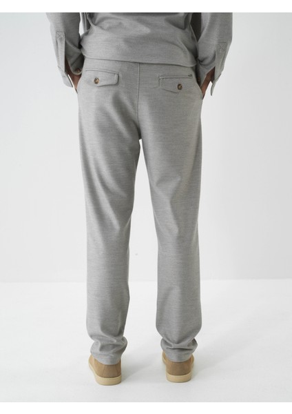 Erkek Bej Esnek Dokulu Regular Fit Jogger Pantolon fırsatları