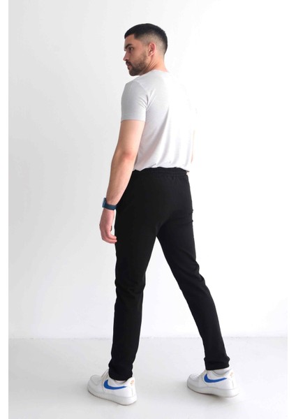 Erkek Beli Bağcıklı Slim Fit Slim Fit Cepli Düz Paça Baskılı Siyah Eşofman Altı modelleri