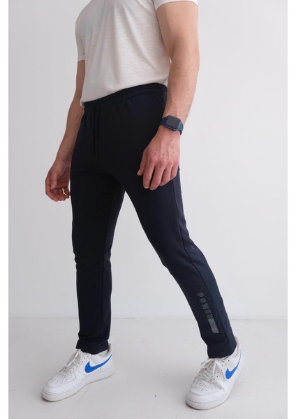 Erkek Beli Bağcıklı Slim Fit Slim Fit Cepli Düz Paça Baskılı Lacivert Eşofman Altı