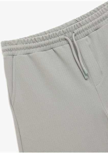 Cep Detaylı Beli Bağcıklı Bermuda Şort indirimleri