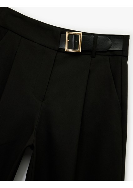 Rahat Kalıp Kemer Detaylı Cepli Normal Bel Geniş Paça Kumaş Pantolon modelleri