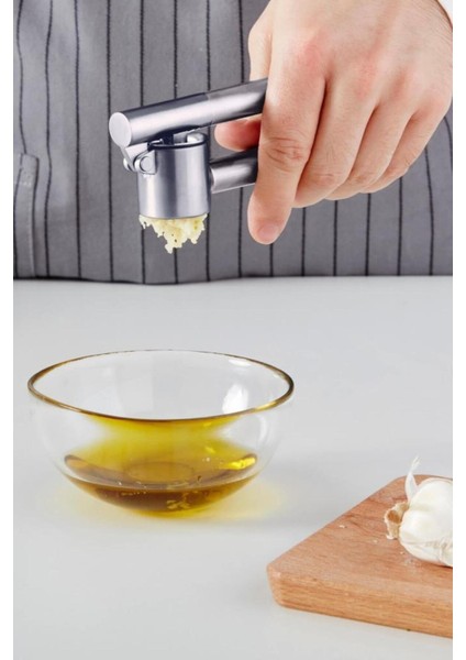 Paslanmaz Çelik Sarımsak Ezici, Hızlı Kargo, Dayanıklı ve Pratik Kullanım modelleri