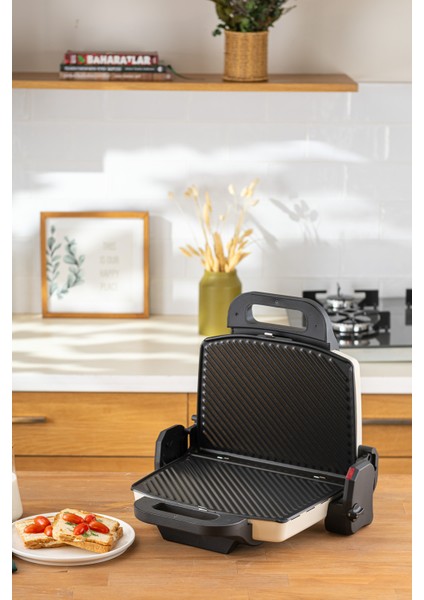 Krem Bej Tost Makinesi ile Lezzetli Tostlar Yapın, Pratik ve Şık Tasarım. fiyatları