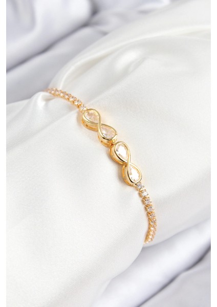 Pirinç Zirkon Taşlı Sonsuzluk Model Gold Renk Asansörlü Kadın Bileklik - TJ-BB7721