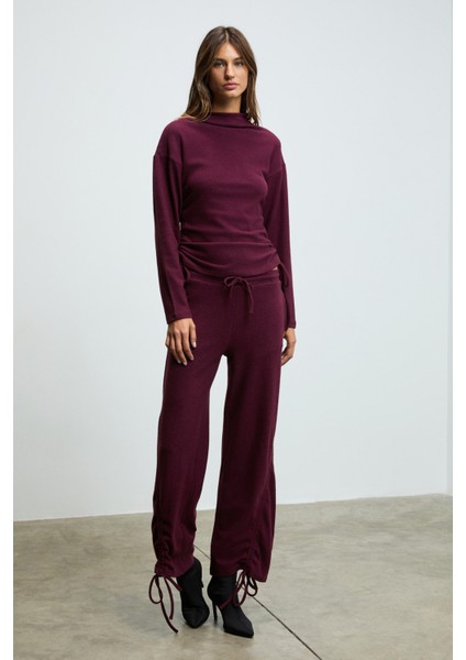 Kandıas Kadın Yumuşak ve Esnek Dokulu Yanlardan Fonksiyonel Büzgülü Bordo Eşofman Altı