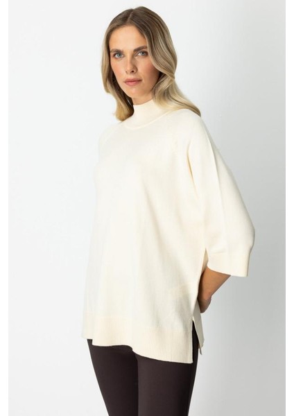 65310 Onteks Arkası Düğmeli Yırtmaçlı Yarım Balıkçı Salaş Kazak modelleri