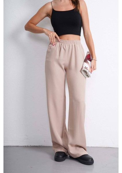 Kadın Bol Kesim Beli Lastikli Yüksek Bel Düğmeli Günlük Cepli Pantolon Geniş Paça modelleri