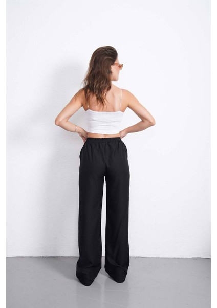 Kadın Bol Kesim Beli Lastikli Yüksek Bel Düğmeli Günlük Cepli Pantolon Geniş Paça modelleri