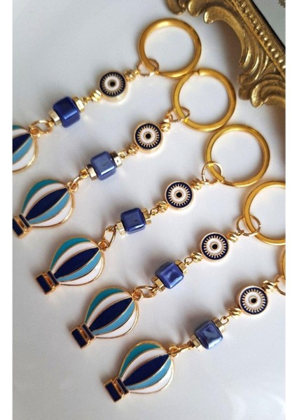 Hediyelik 5'li Nazar Boncuklu Özgürlük Simgesi Balon Detaylı Lacivert Anahtarlık 10,5 cm fiyatları