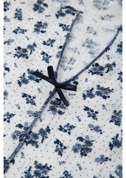 Kadın Pamuklu Çıtır Çiçek Desenli Baby Overloklu Fiyonk Detaylı Uzun Kollu Pijama Takımı indirimleri