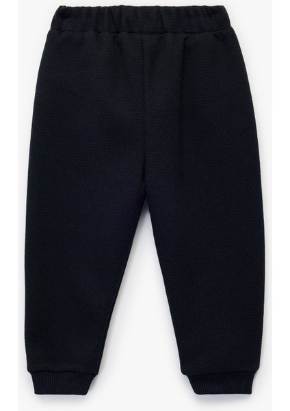 Düğme Detaylı Cepli Beli Lastikli Basic Pantolon Görünümlü Eşofman Altı fiyatları