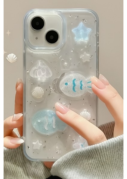 Apple iPhone 13 - 14 - 15 Kılıf Simli Mavi Balık ve Deniz Kabuğu Desenli Tasarımlı Silikon Kapak fiyatları
