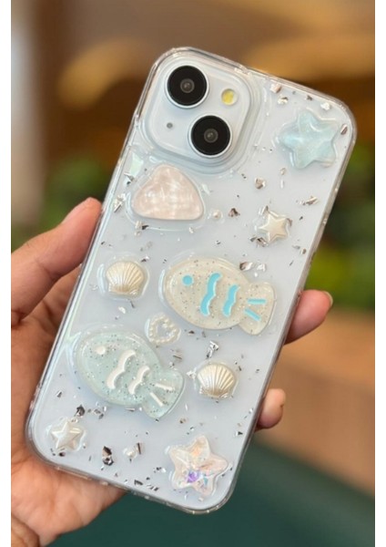 Apple iPhone 13 - 14 - 15 Kılıf Simli Mavi Balık ve Deniz Kabuğu Desenli Tasarımlı Silikon Kapak fırsatları