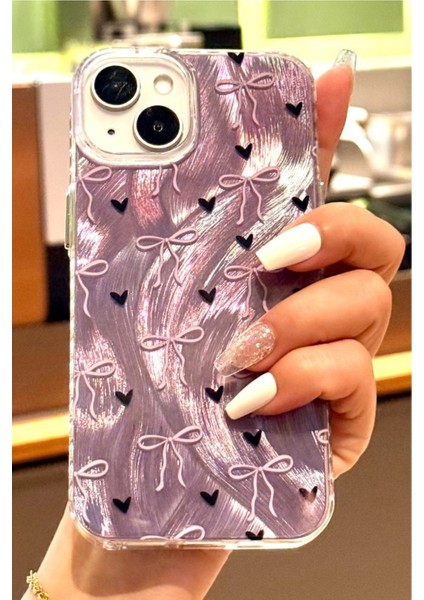 iPhone 13/14/15 Kılıf Hologramlı Siyah Kalp Mor Fiyonk Desenli Darbe Emici Kamera Korumalı Silikon fiyatları