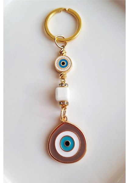 Hediyelik Zirkon Taşlı Bej Rengi Nazar Boncuklu Anahtarlık