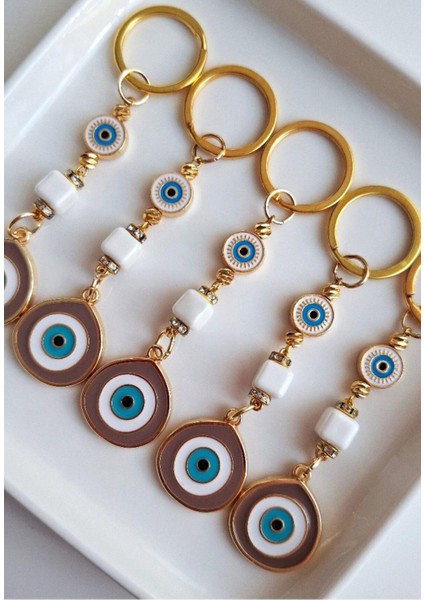 Hediyelik Zirkon Taşlı Bej Rengi Nazar Boncuklu Anahtarlık indirimleri